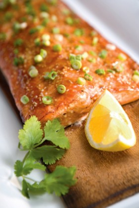 Mmmm... that looks tasty. Salmon is not easy to cook but cooking it on a cedar plank certainly helps.  Add a little dash of lemon juice and some scallions and you've got a fish dish to die for.