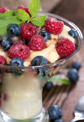 Homemade fruity vanilla Pudding with fresh berries