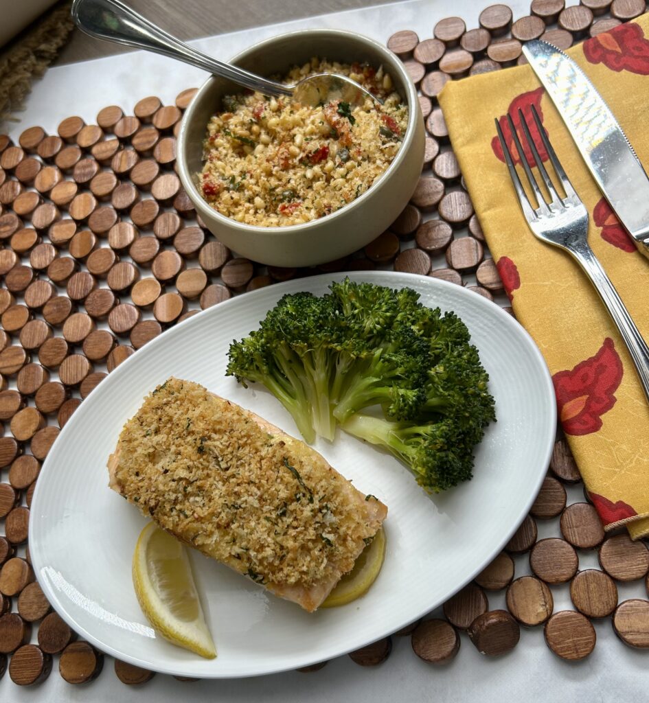 A plate of food with a bowl of rice and broccoli