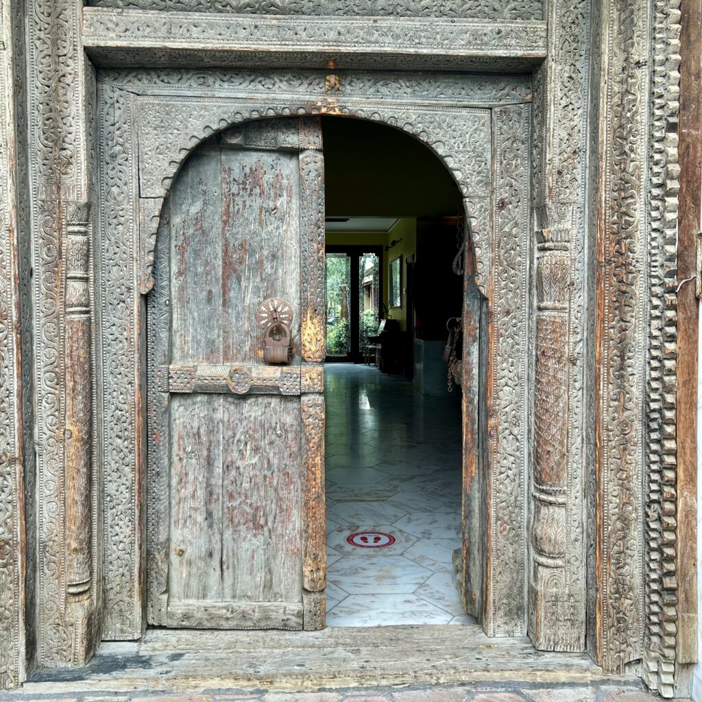 An old wooden door with a doorknob