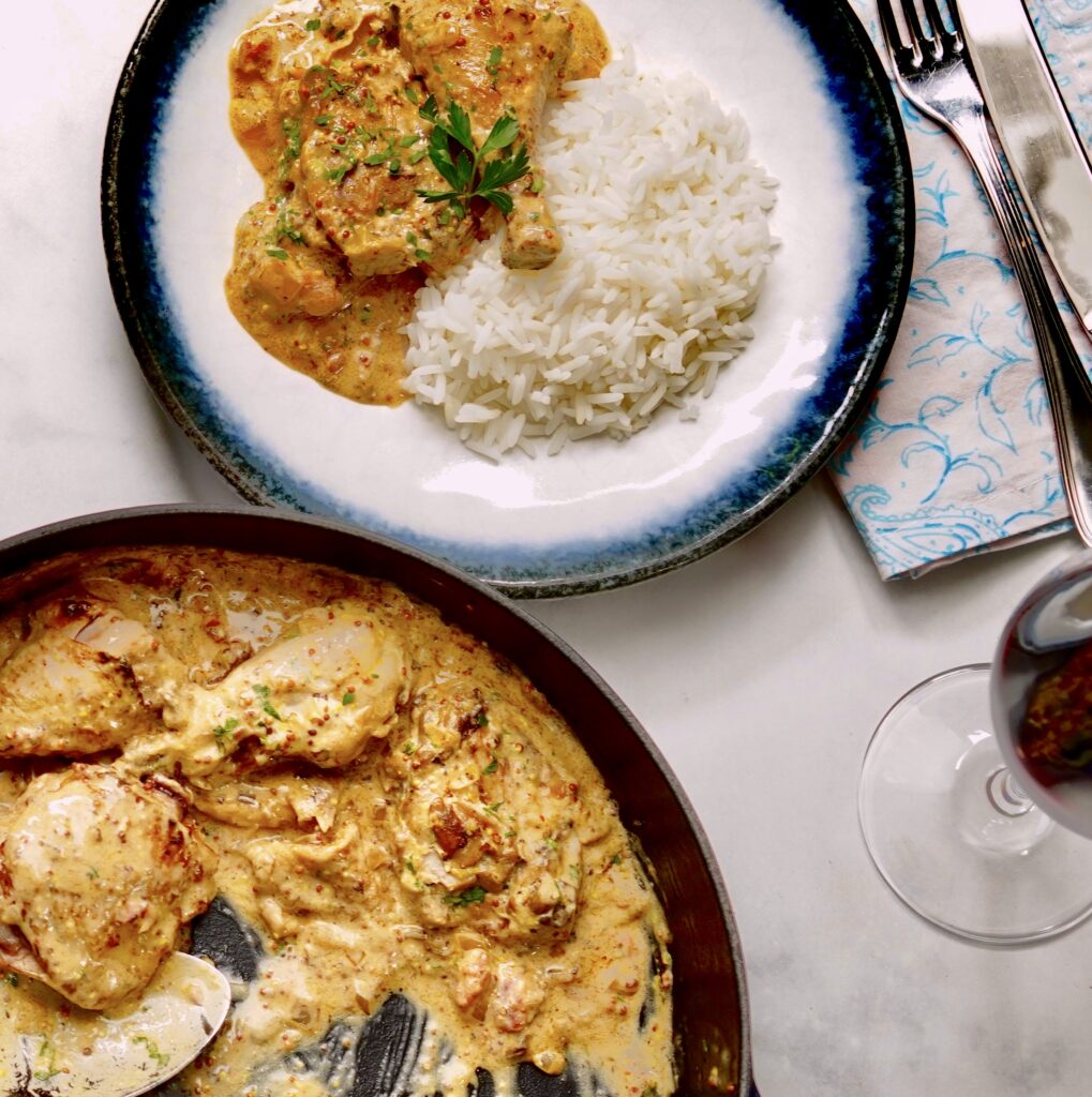 Two plates of food on a table