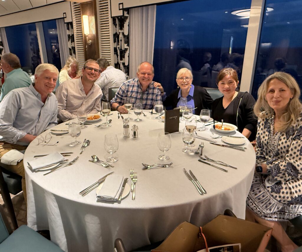 A group of people sitting at a table
