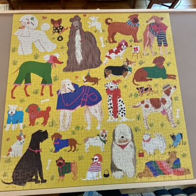 A puzzle with many dogs on it