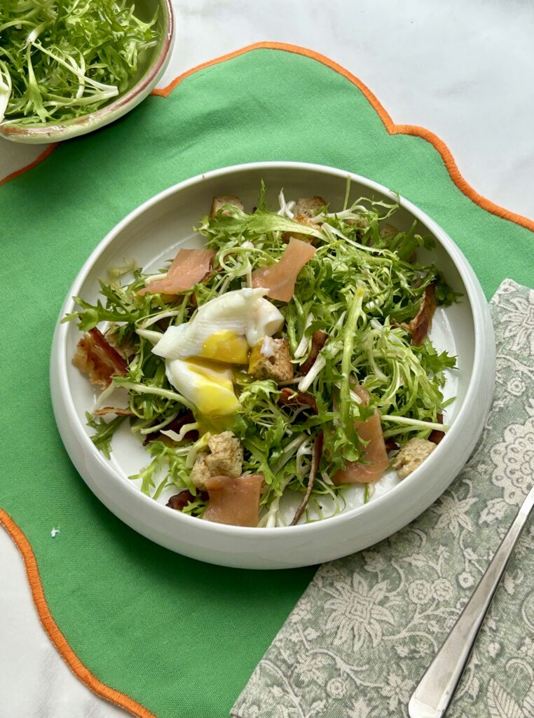 A bowl of salad on a table