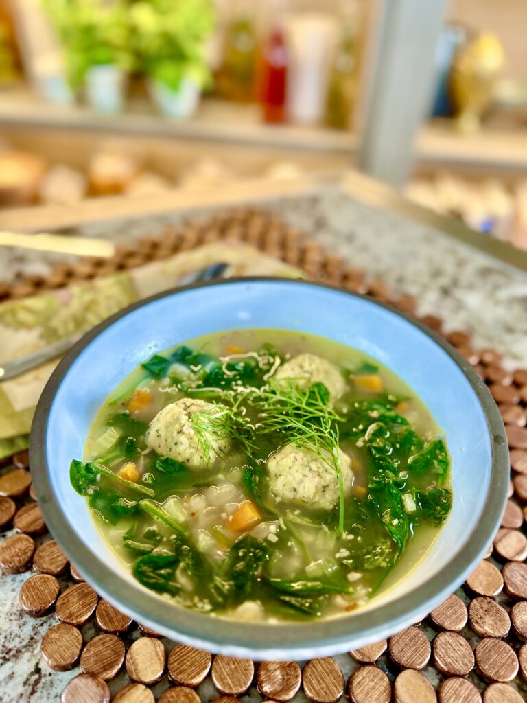 A bowl of soup on a table